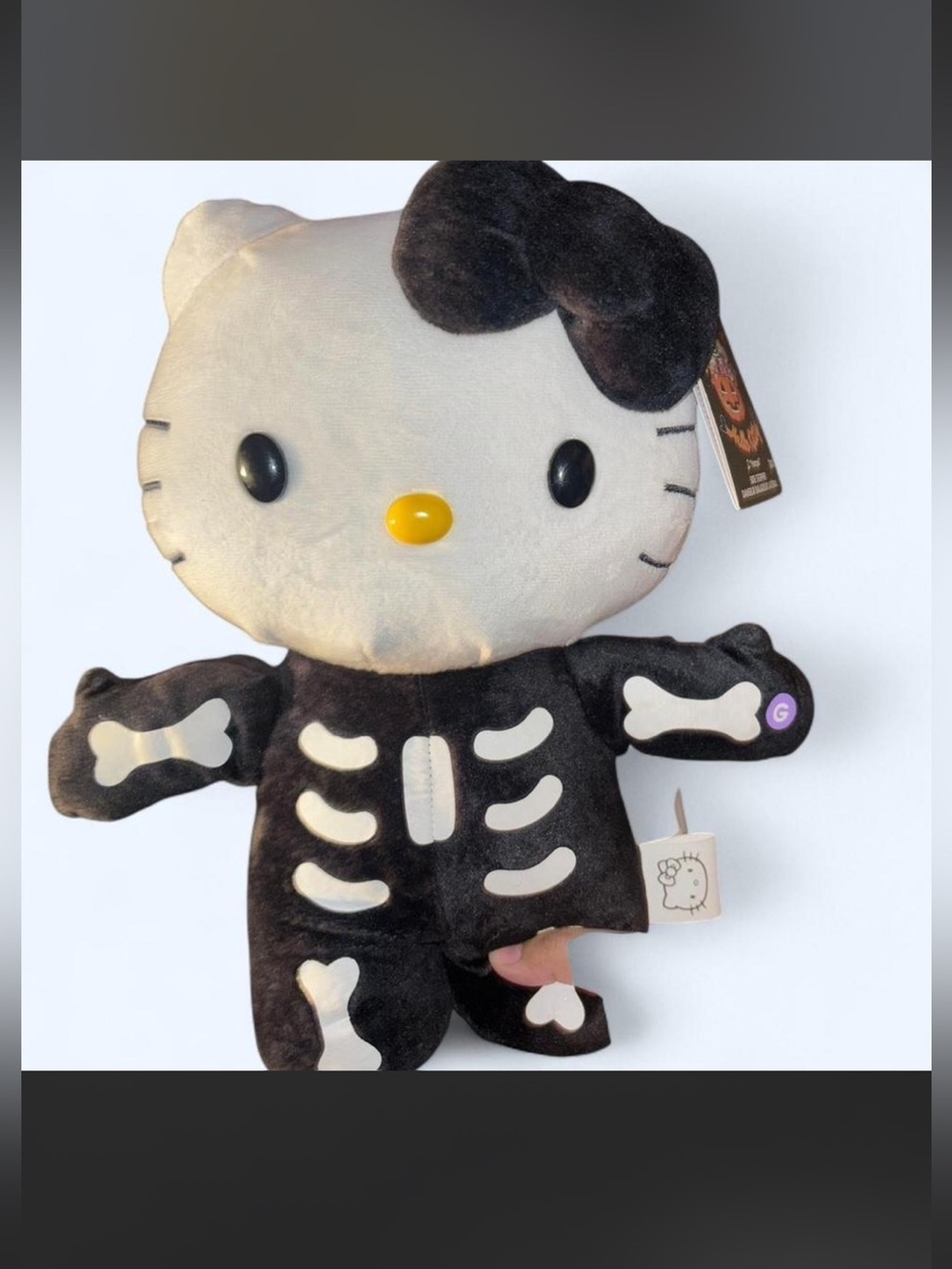 Hello Kitty Black & White Skeleton Plush with Yellow Nose Side Stepper